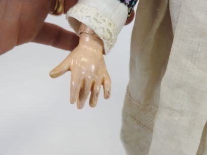 UNIS FRANCE.
Bisque head doll, fixed eyes,...