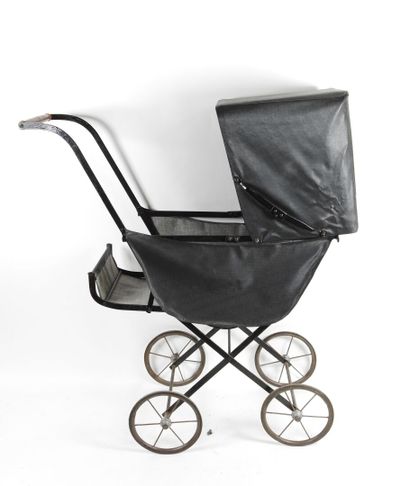 Doll's baby carriage in metal and leather-look...