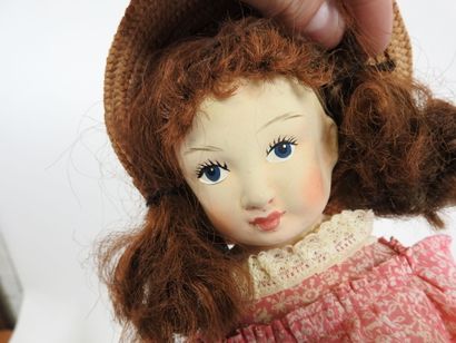 LIMMER.
Boiled cardboard doll with painted...