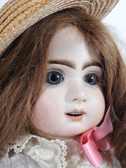 Bisque head doll, fixed glass eyes, open...
