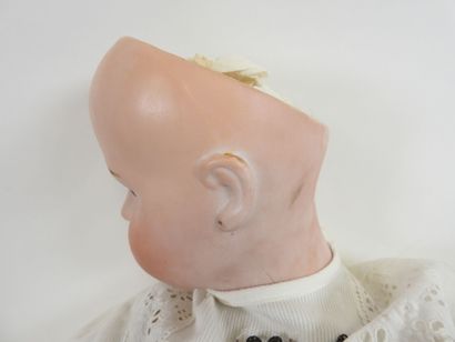 Bisque head doll, fixed eyes, open mouth...