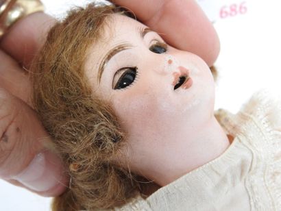SFBJ.
Little doll with bisque head, sleepy...
