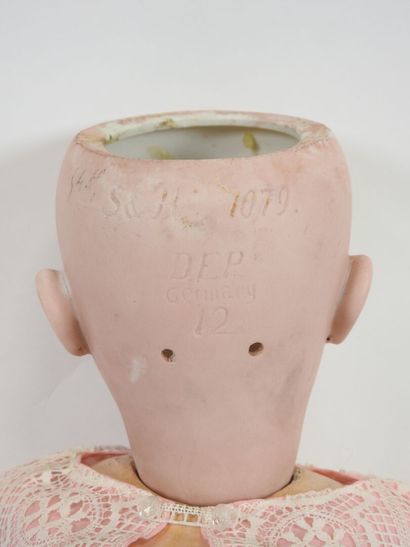 SIMON & HALBIG.
Bisque head doll, fixed eyes,...
