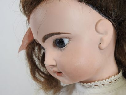 Bisque head doll, fixed eyes, open mouth...
