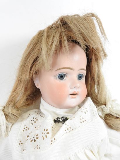 Bisque head doll, fixed eyes, open mouth...