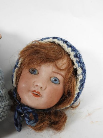 UNIS FRANCE.
Bisque head doll with open eyes...