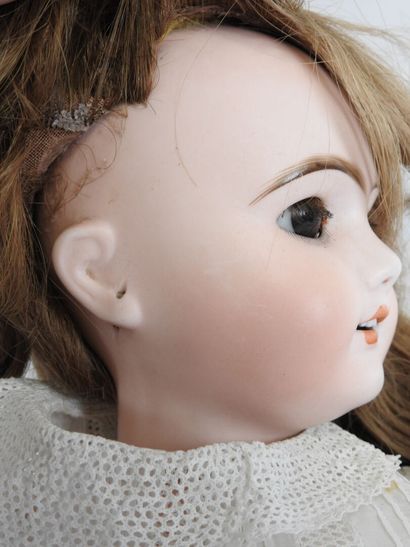 SFBJ.
Bisque head doll, fixed eyes, open...