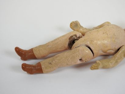 UNIS FRANCE.
Little doll with bisque head,...