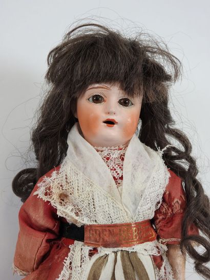 Doll with boiled cardboard head, fixed glass...