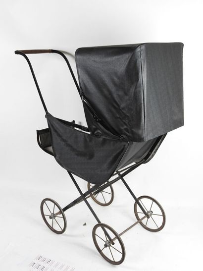 Doll's baby carriage in metal and leather-look...