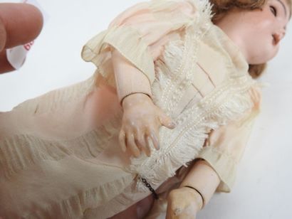 SFBJ.
Little doll with bisque head, sleepy...