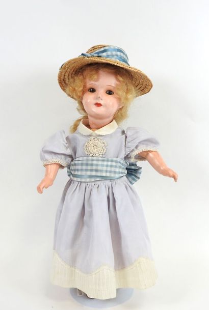 Doll with boiled cardboard head, fixed eyes,...