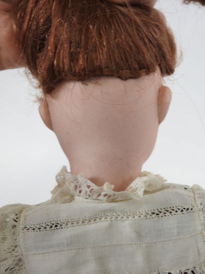 Bisque head doll, fixed eyes, open mouth...