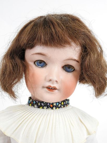 UNIS FRANCE.
Bisque head doll, fixed eyes,...