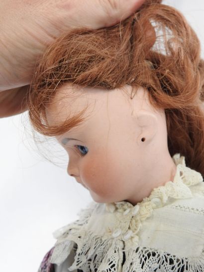 Bisque head doll, fixed eyes, open mouth...