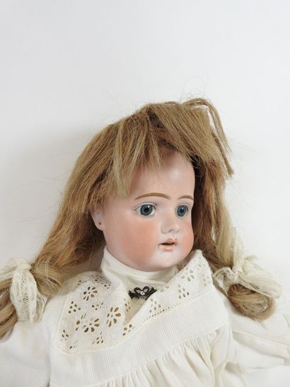 Bisque head doll, fixed eyes, open mouth...