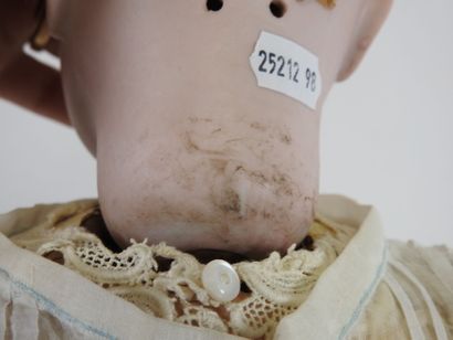 Doll with bisque head, fixed eyes, open mouth...