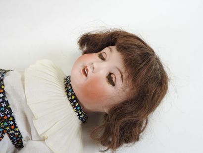 UNIS FRANCE.
Bisque head doll, fixed eyes,...