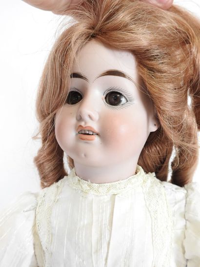Bisque head doll, fixed eyes, open mouth...