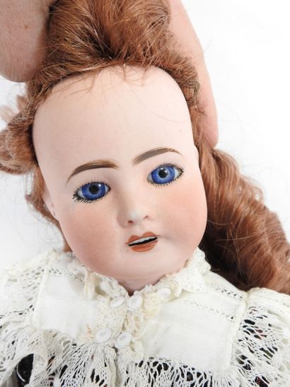 Bisque head doll, fixed eyes, open mouth...