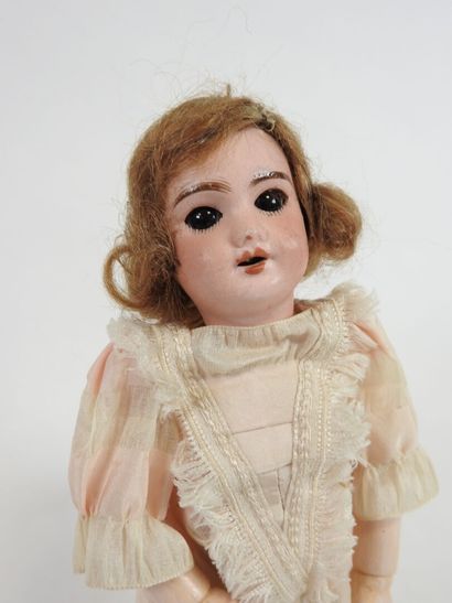 SFBJ.
Little doll with bisque head, sleepy...