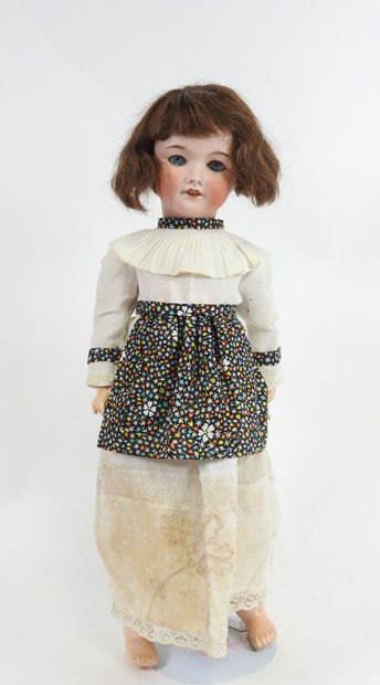 UNIS FRANCE.
Bisque head doll, fixed eyes,...