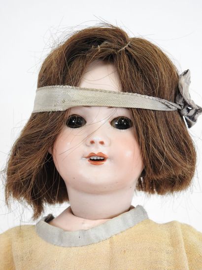 SFBJ.
Doll with bisque head, sleeping eyes,...