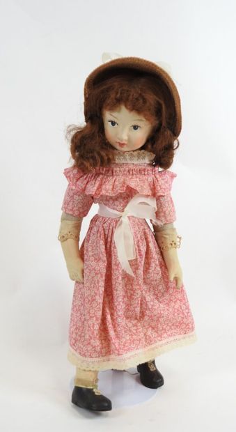 LIMMER.
Boiled cardboard doll with painted...