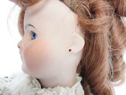 Bisque head doll, fixed eyes, open mouth...