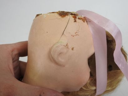 UNIS FRANCE.
Doll with boiled cardboard head,...