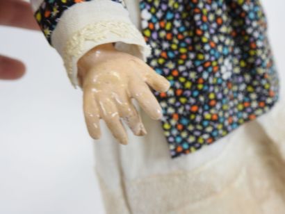 UNIS FRANCE.
Bisque head doll, fixed eyes,...