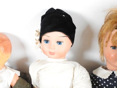 Set of four plastic and celluloid dolls.
H....