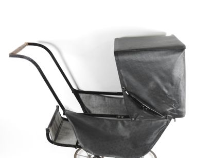 Doll's baby carriage in metal and leather-look...