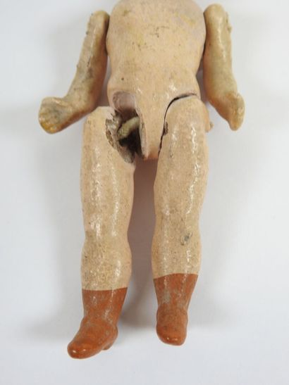 UNIS FRANCE.
Little doll with bisque head,...