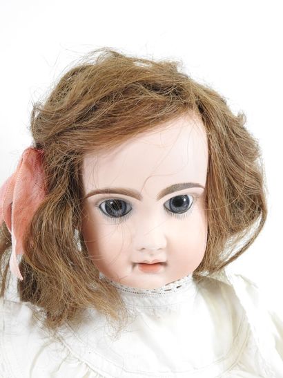 Bisque head doll, fixed eyes, open mouth...