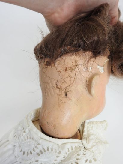 SFBJ.
Boiled cardboard head doll, open eyes,...
