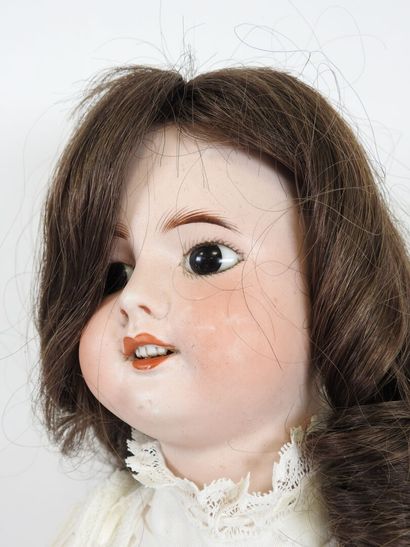 SFBJ.
Bisque head doll, fixed eyes, open...
