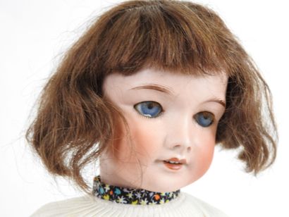 UNIS FRANCE.
Bisque head doll, fixed eyes,...