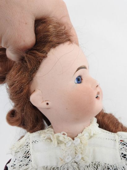 Bisque head doll, fixed eyes, open mouth...