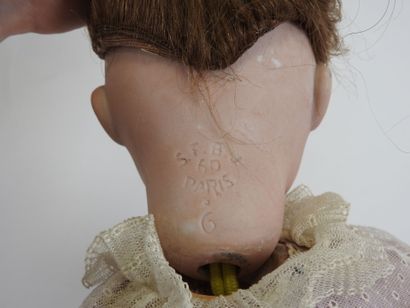 SFBJ.
Bisque head doll, sleeping eyes, open...