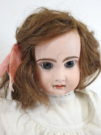 Bisque head doll, fixed eyes, open mouth...