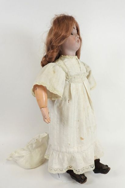 Bisque head doll, fixed eyes, open mouth...