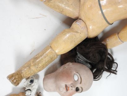 Doll, porcelain head, glass eyes (damaged),...