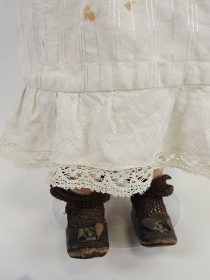Bisque head doll, fixed eyes, open mouth...
