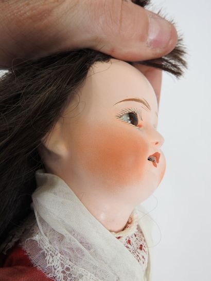 Doll with boiled cardboard head, fixed glass...