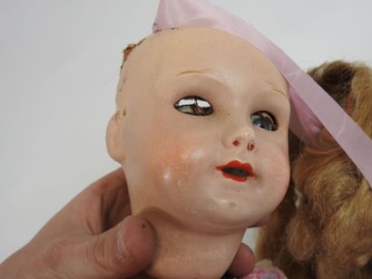 UNIS FRANCE.
Doll with boiled cardboard head,...