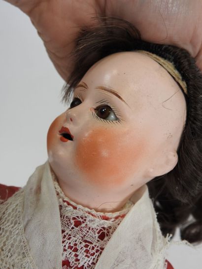 Doll with boiled cardboard head, fixed glass...