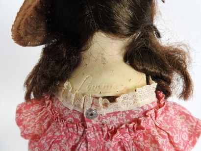 LIMMER.
Boiled cardboard doll with painted...