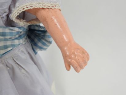 Doll with boiled cardboard head, fixed eyes,...