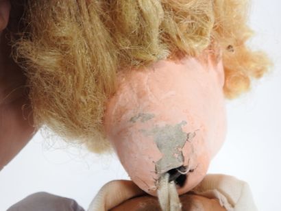 Doll with boiled cardboard head, fixed eyes,...
